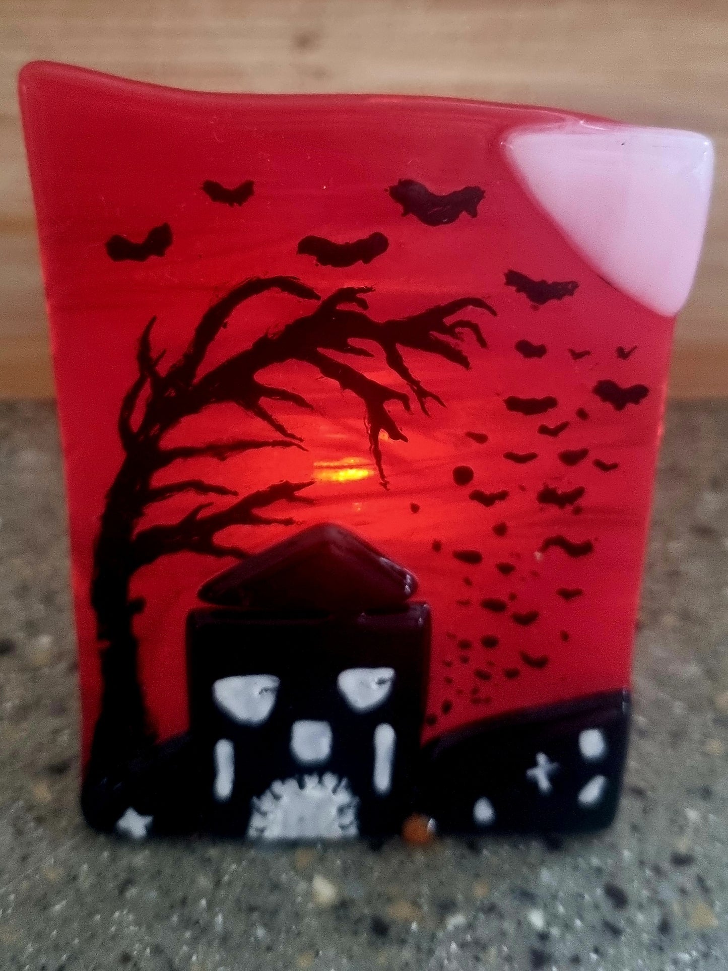 Fused glass scary scene.