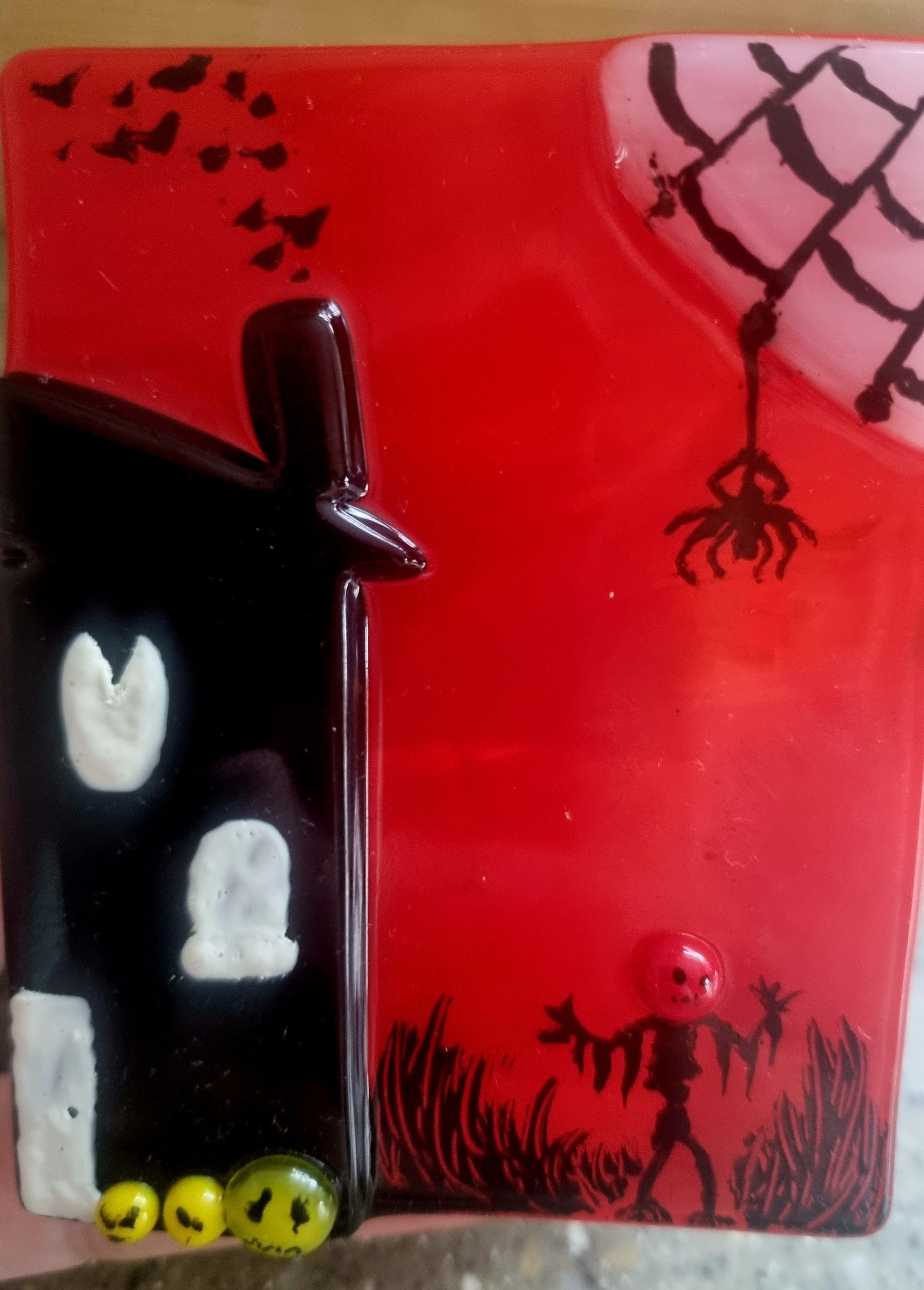 Spooky scene tealight holder.
