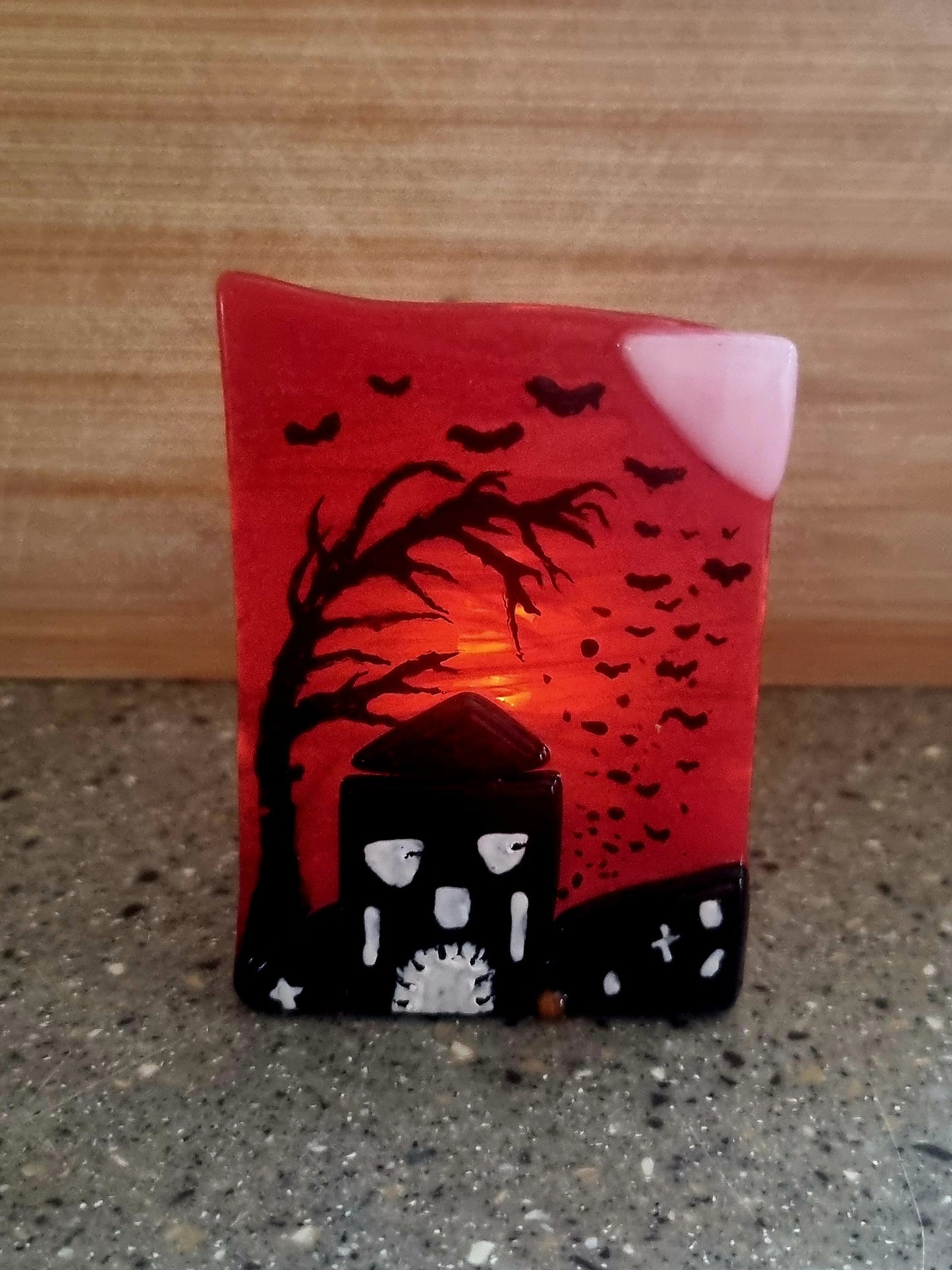 Fused glass scary scene.