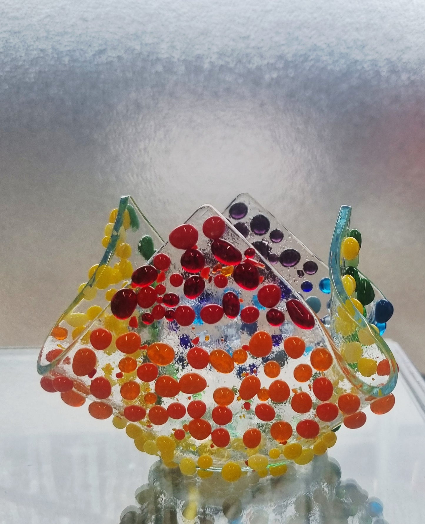 'Rainbow confetti' fused glass tealight holder.