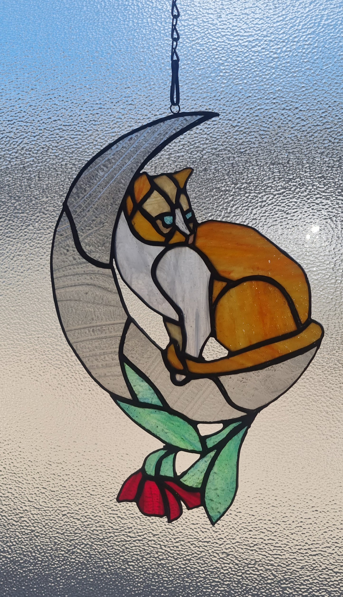'Cat in the moon' stained glass suncatcher.
