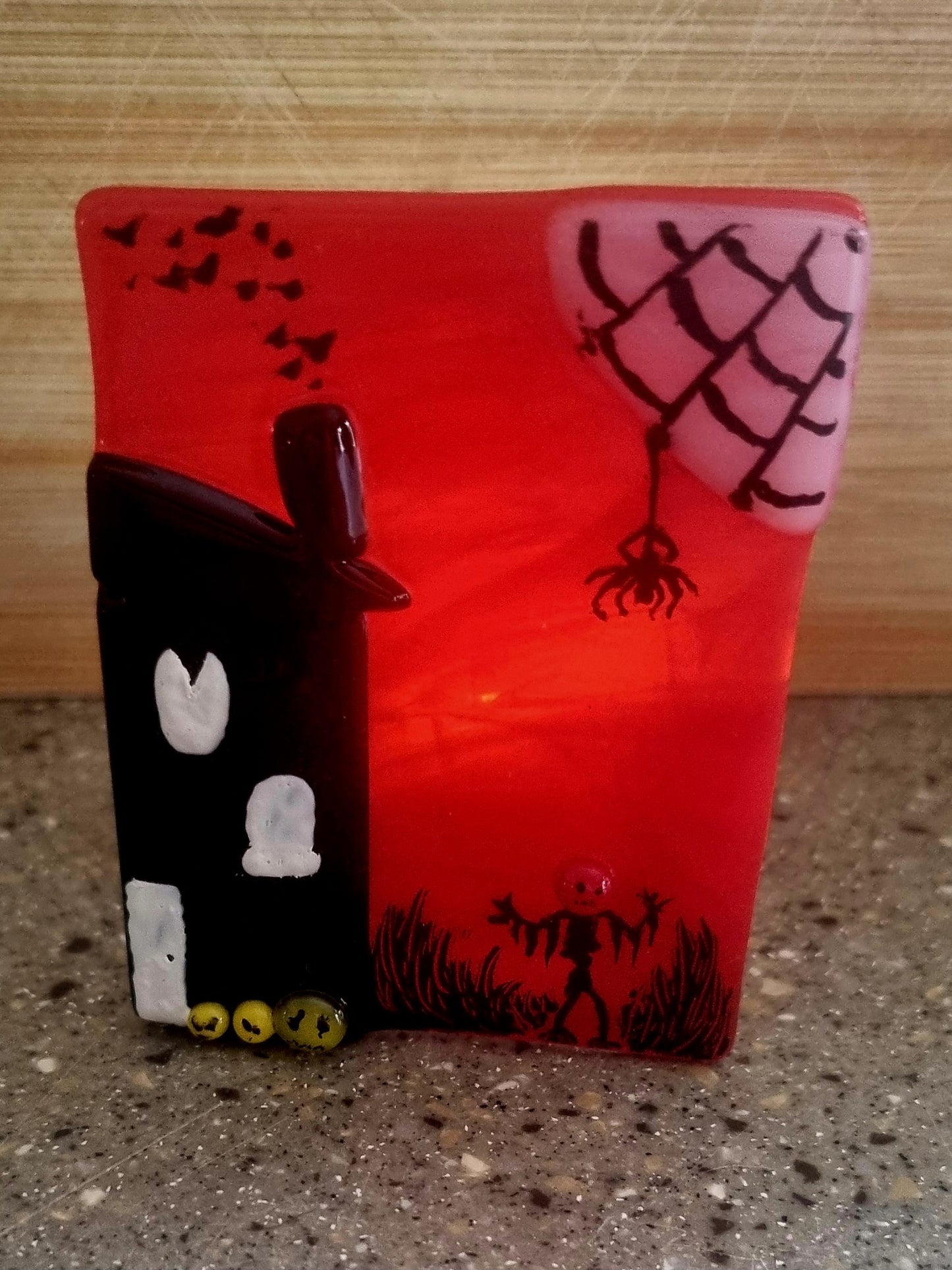 Spooky scene tealight holder.
