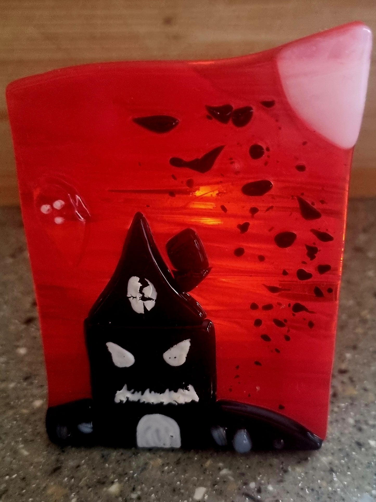 Spooky house tealight holder.