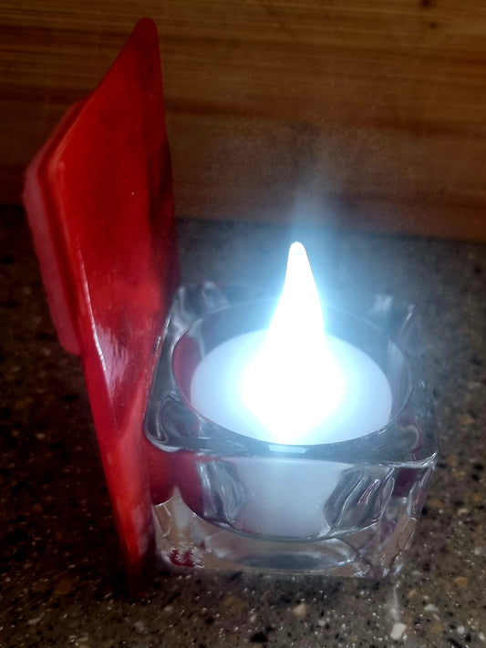 Spooky scene tealight holder.