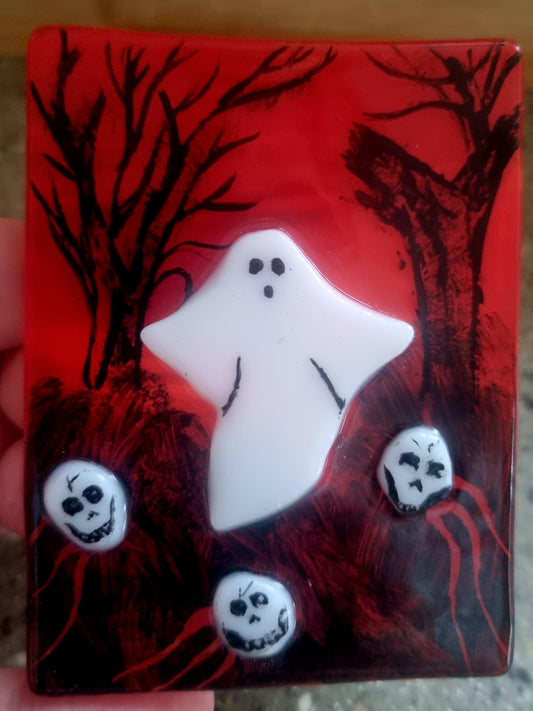 Spooky ghost tealight holder.