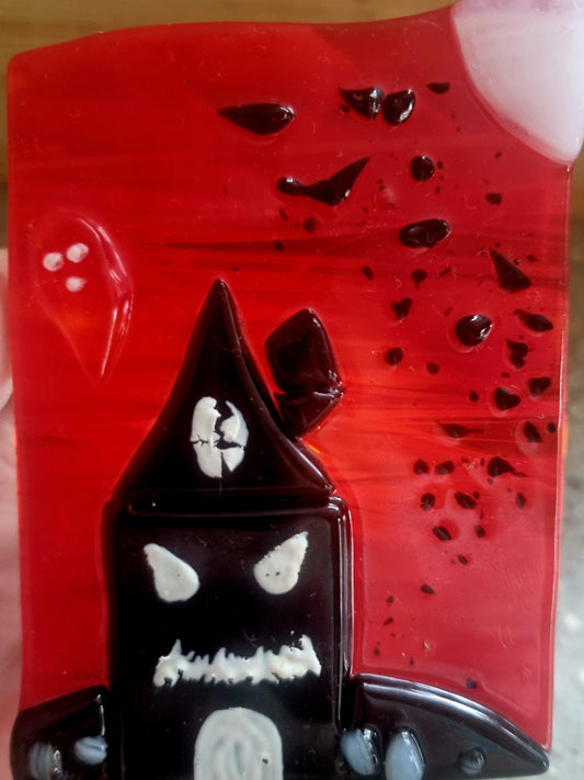 Spooky house tealight holder.