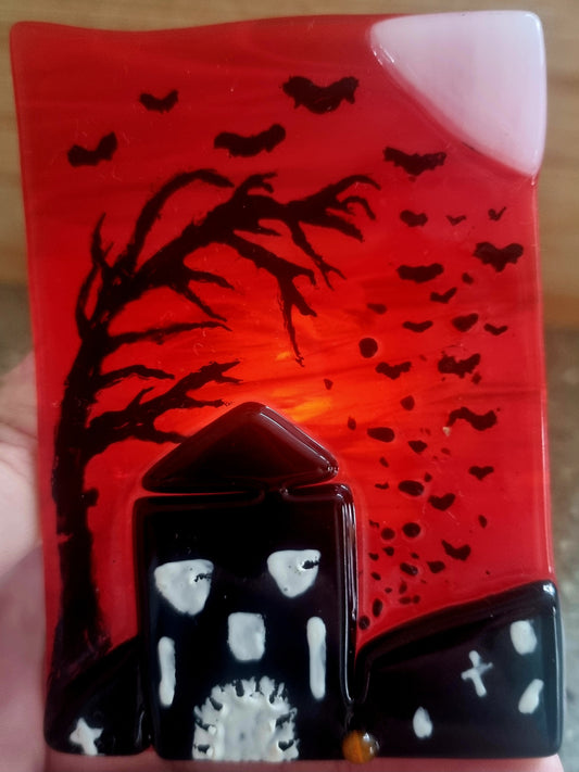 Fused glass scary scene.