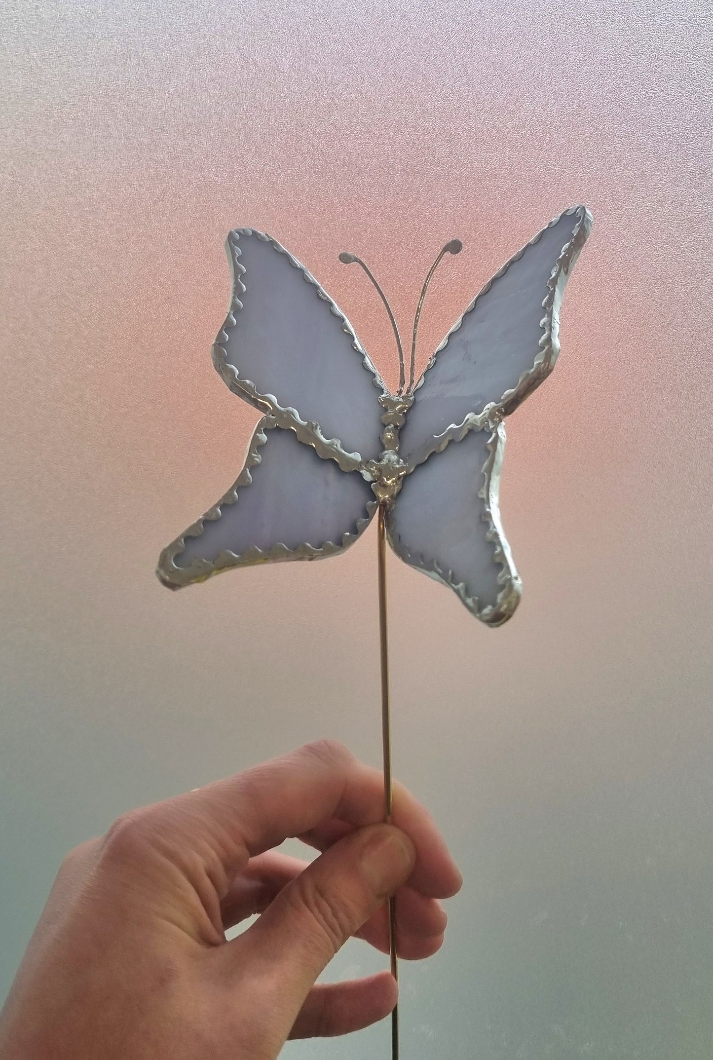 'Plant butterfly' stained glass plant stake.