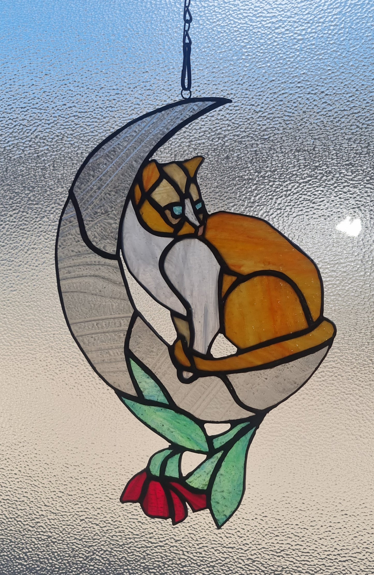 'Cat in the moon' stained glass suncatcher.