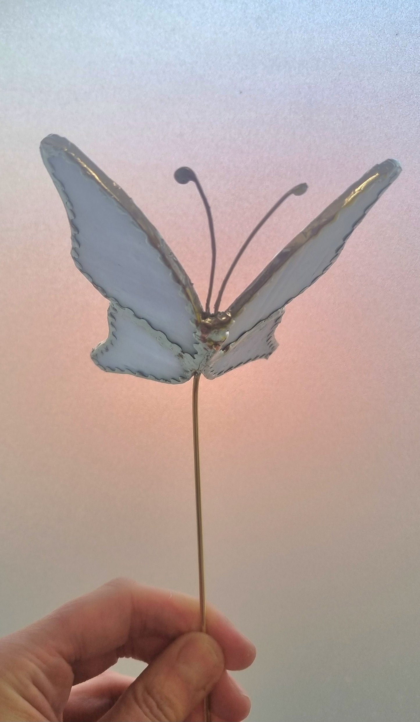 'Plant butterfly' stained glass plant stake.